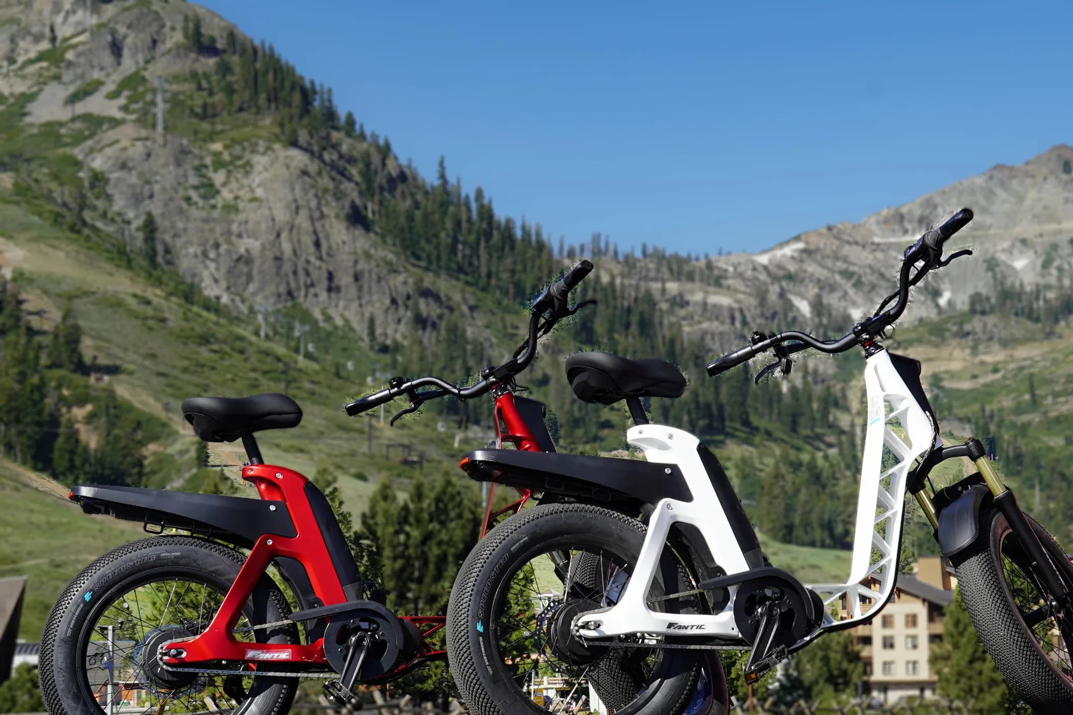 Fantic Issimo electric bikes at Olympic Valley with Palisades Tahoe behind them
