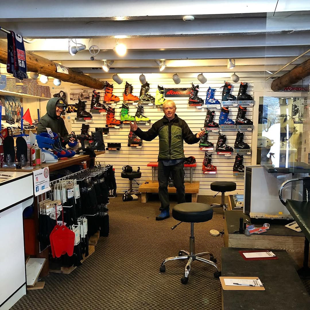 Founder Buck in the shop with ski boots